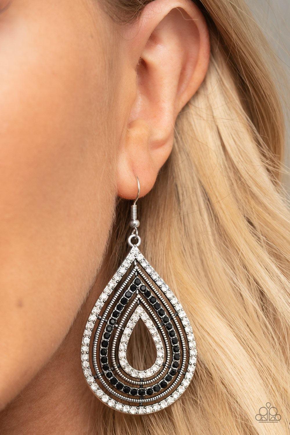 Paparazzi Accessories 5th Avenue Attraction - Black White and black rhinestones encrusted frames and textured silver frames alternate into a dramatic teardrop for a refined flair. Earring attaches to a standard fishhook fitting. Jewelry