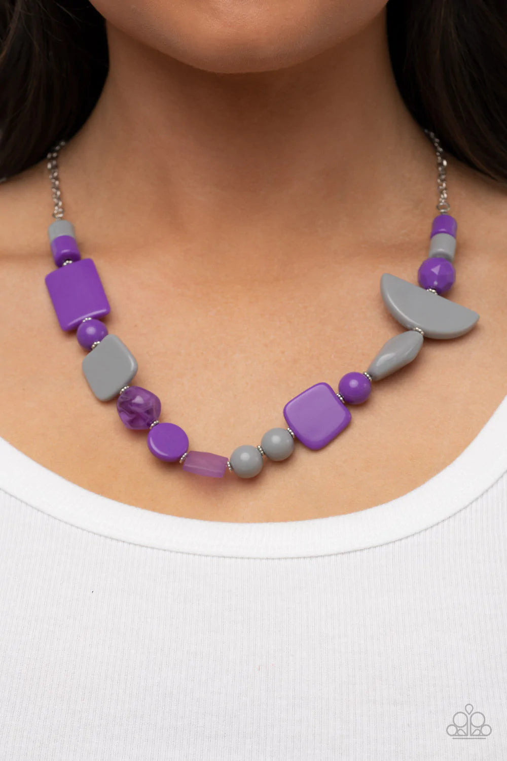 Paparazzi Accessories Tranquil Trendsetter - Purple Featuring the bold hues of Ultimate Gray and purple, mismatched acrylic and faux rock beads are haphazardly threaded along an invisible wire below the collar for an abstract artisan vibe. Features an adj