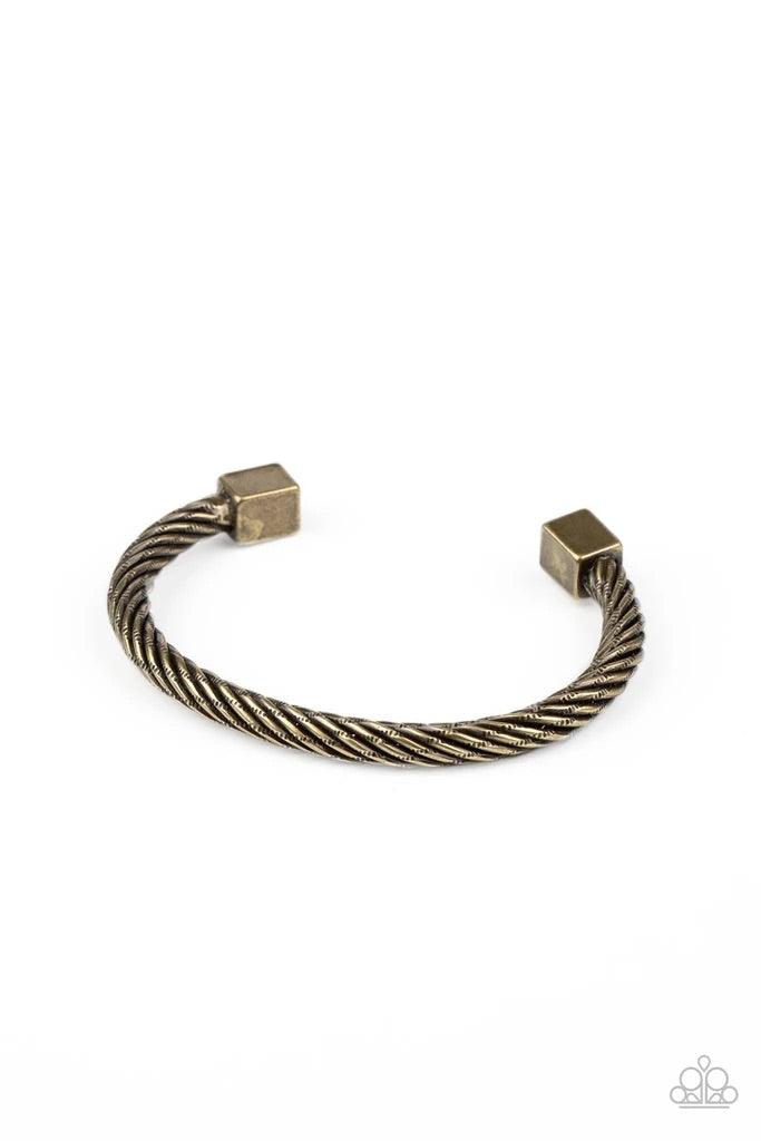 Paparazzi Accessories Block It Out - Brass Featuring two brass square fittings, hammered brass bars twist into a rustic cuff around the wrist. Sold as one individual bracelet. Jewelry