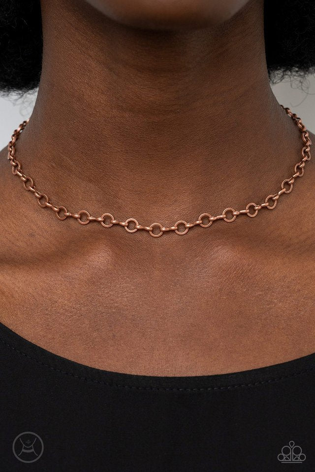 Paparazzi Accessories Keepin’ It Chic - Copper Dainty copper rings alternate with pinched copper links around the neck, creating a chic minimalist inspired look. Features an adjustable clasp closure. Sold as one individual choker necklace. Includes one pa