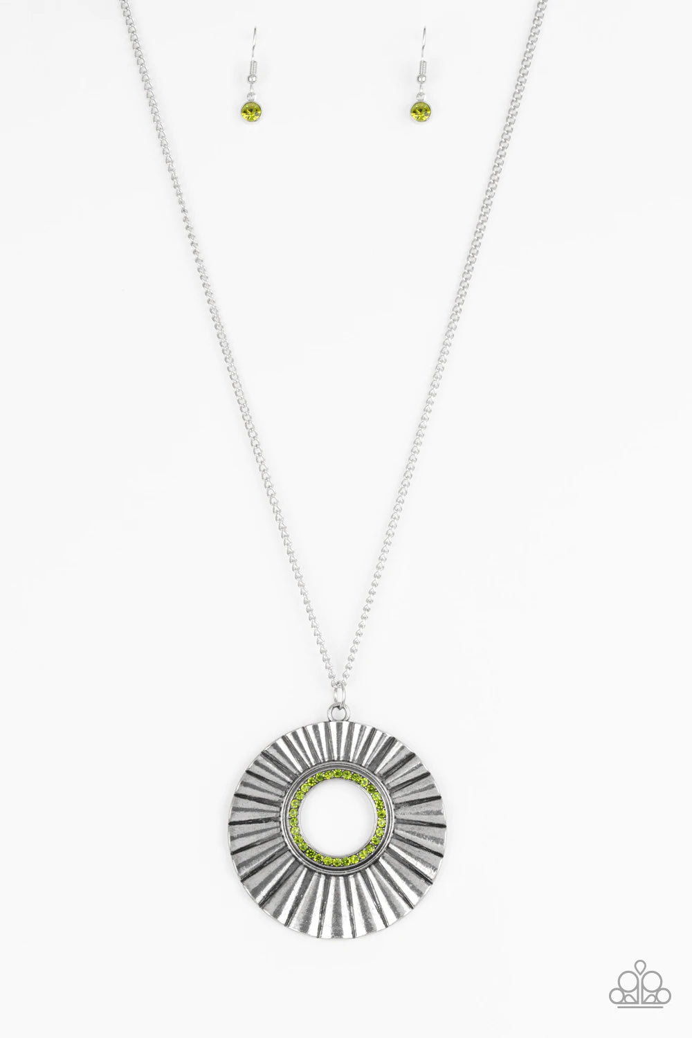 Paparazzi Accessories Chicly Centered - Green Brushed in a gritty antiqued finish, a rippling silver frame flares from a green rhinestone encrusted center for an edgy look. Features an adjustable clasp closure. Sold as one individual necklace. Includes on