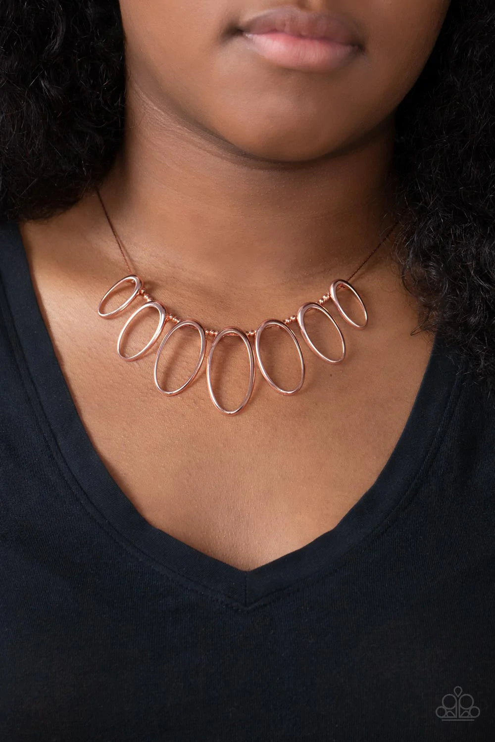 Paparazzi Accessories The MANE Ingredient - Copper Separated by trios of dainty shiny copper beads, shiny silver ovals gradually increase in size as they glide along a dainty and flat shiny copper chain below the collar, resulting in an airy fringe. Featu