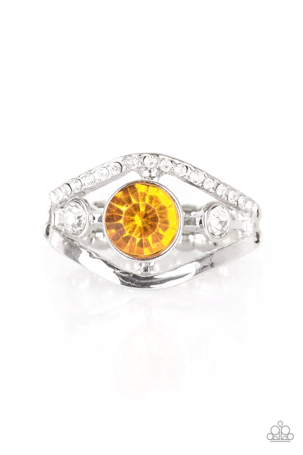 Paparazzi Accessories Rich with Richness - Yellow A white rhinestone encrusted band and glistening silver band wave around a radiating yellow and white rhinestone center for a refined look. Features a dainty stretchy band for a flexible fit. Jewelry