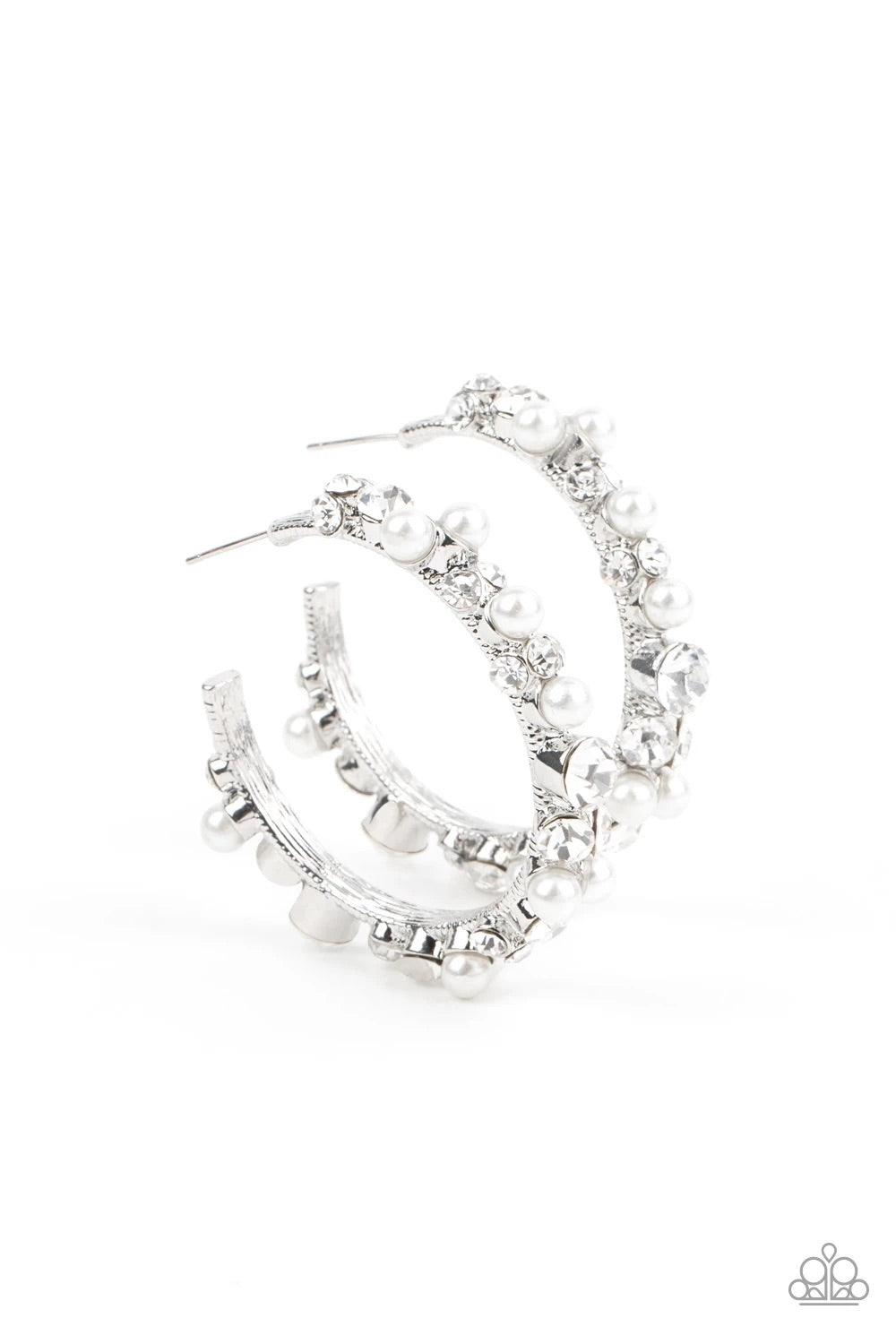 Paparazzi Accessories Let There Be Socialite - White A bubbly array of classic white rhinestones and glassy white rhinestones are encrusted along the front of a silver hoop, creating an elegantly effervescent look. Earring attaches to a standard post fitt