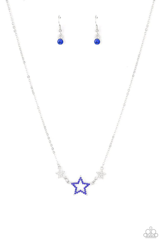 Paparazzi Accessories United We Sparkle - Blue A blue rhinestone encrusted silver star is flanked by two dainty white rhinestone encrusted silver stars, creating a sparkly patriotic pendant below the collar. Features an adjustable clasp closure. Sold as o
