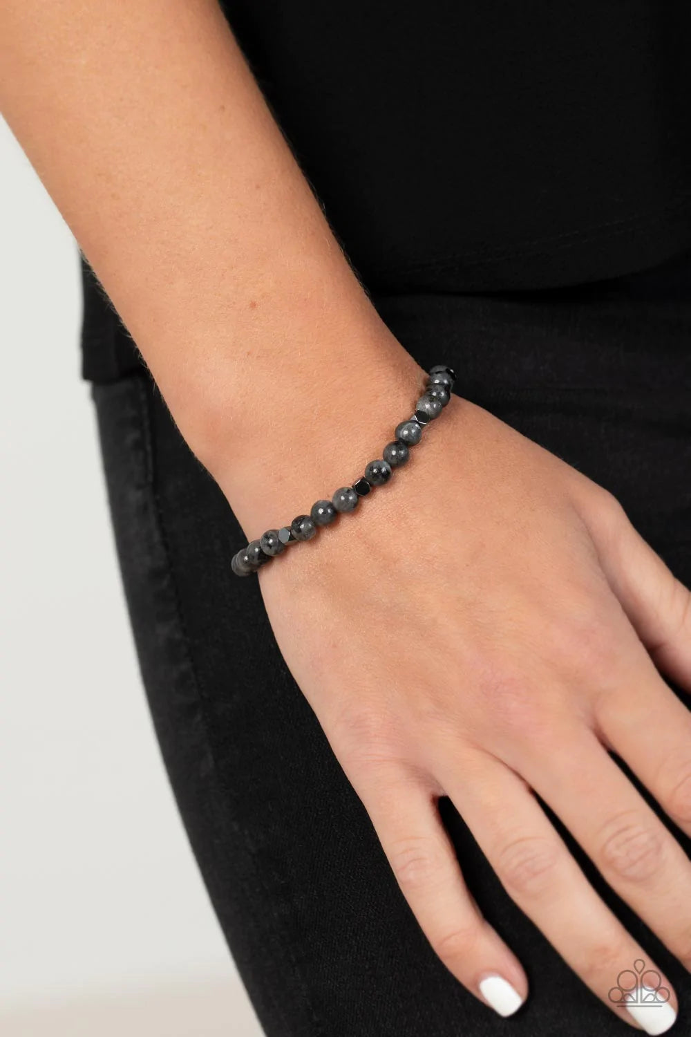 Paparazzi Accessories Interstellar Solitude - Silver A dainty collection of speckled gray stone beads and faceted hematite cube beads are threaded along a stretchy band around the wrist for an earthy flair. Sold as one individual bracelet. Jewelry