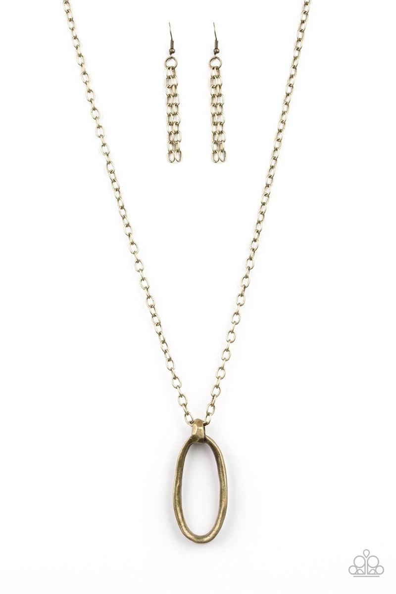Paparazzi Accessories Grit Girl - Brass Delicately hammered in a gritty antiqued finish, a bold asymmetrical brass ring swings from the bottom of a lengthened brass chain for an industrial look. Features an adjustable clasp closure. Sold as one individual
