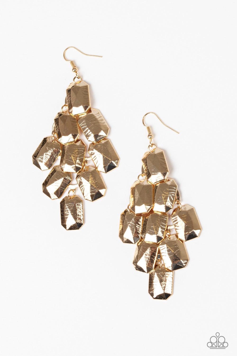 Paparazzi Accessories Contemporary Catwalk - Gold Delicately etched in linear patterns, faceted gold emerald-shaped frames cascade from the ear for a contemporary look. Earring attaches to a standard fishhook fitting. Jewelry
