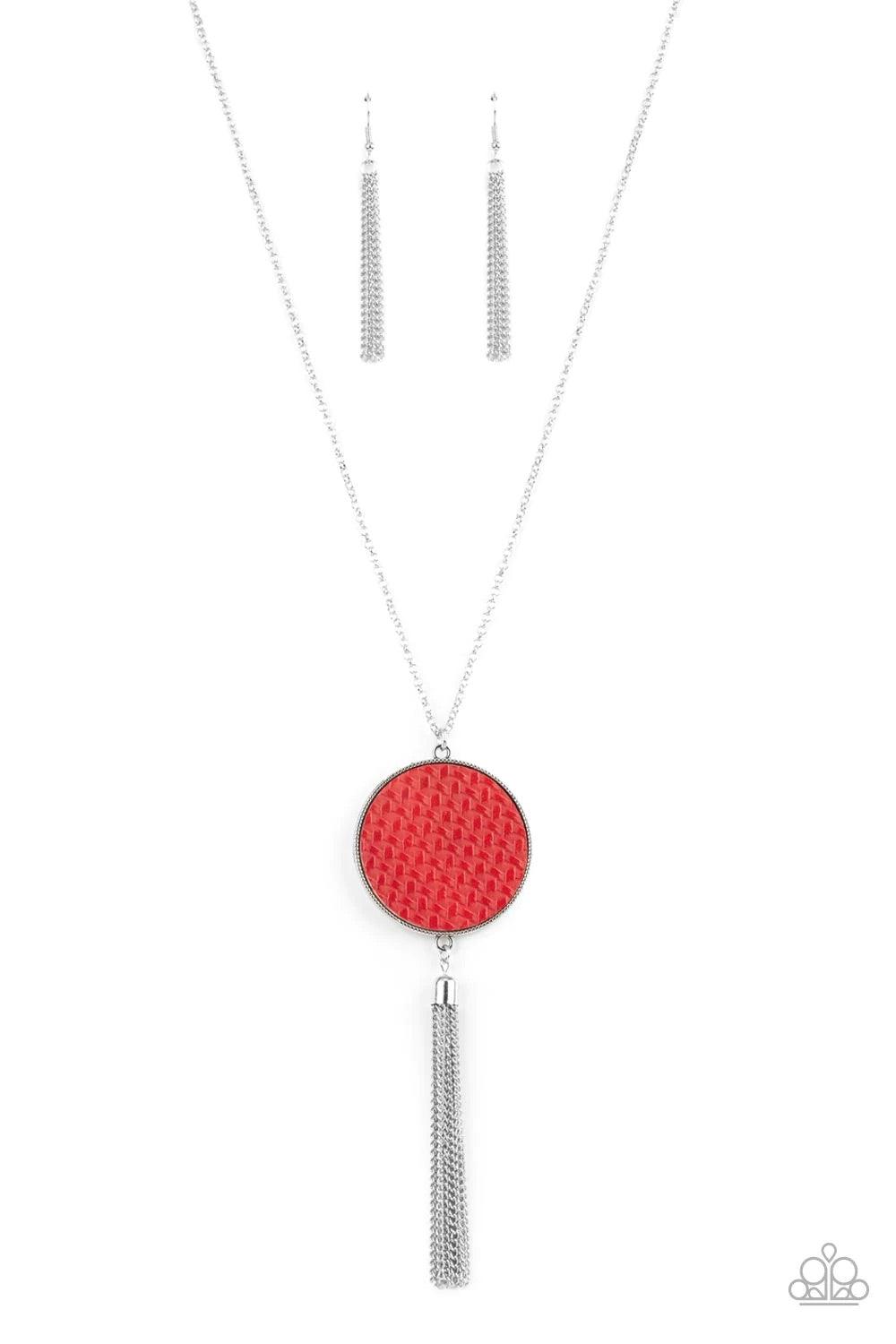 Paparazzi Accessories Wondrously Woven - Red Featuring a faux woven finish, a shiny piece of Fire Whirl leather is pressed into a studded circular frame at the bottom of a lengthened silver chain. Capped in a frame, a silver chain tassel streams out from