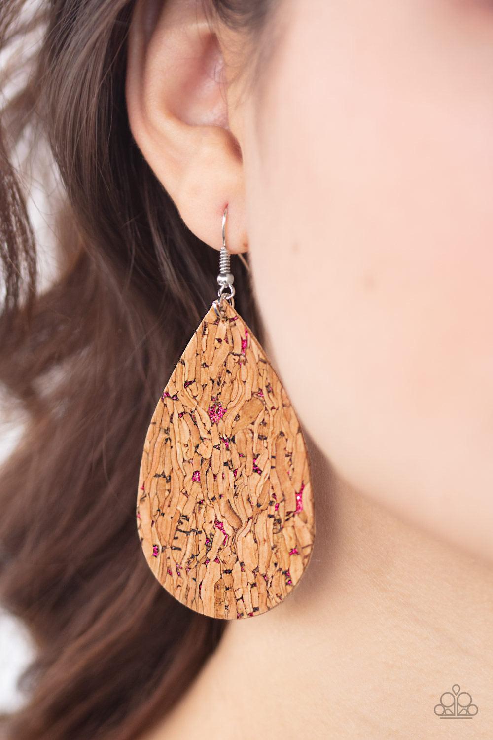 Paparazzi Accessories CORK It Over - Pink Flecked in metallic pink accents, a cork-like teardrop frame swings from the ear for a seasonal look. Earring attaches to a standard fishhook fitt Jewelry