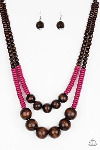 Paparazzi Accessories Cancun Cast Away - Pink Earthy brown and vivacious pink wooden beads and discs are threaded along shiny strands of brown cording, creating colorful layers. Features a button loop closure. Sold as one individual necklace. Includes one