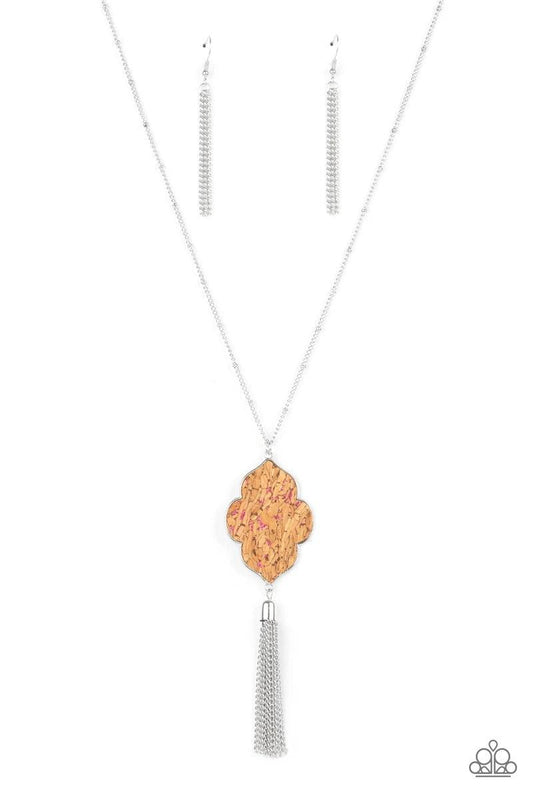 Paparazzi Accessories One Night in Casablanca - Pink Flecked in glittery pink sparkles, a scalloped cork frame is pressed into a sleek silver frame at the bottom of a dainty silver satellite chain. A classic silver chain tassel swings from the whimsical p