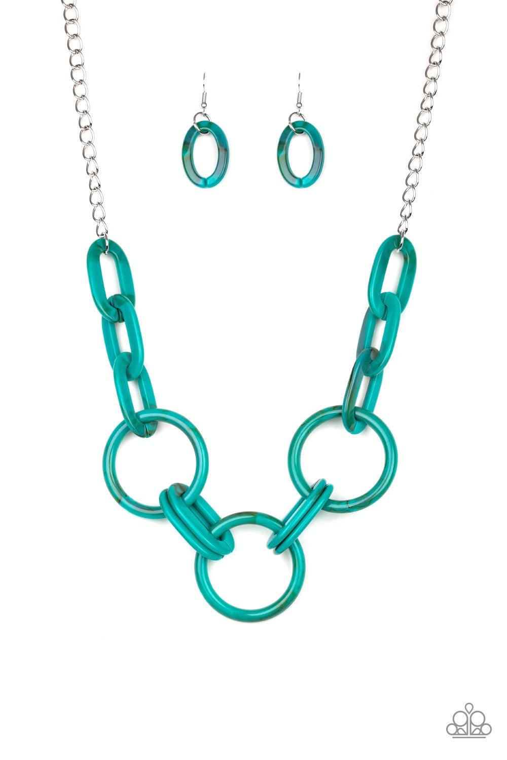 Paparazzi Accessories Turn Up The Heat - Blue Suspended from a shimmery silver chain, a collision of acrylic blue links connect below the collar in a statement-making fashion. Features an adjustable clasp closure. Jewelry