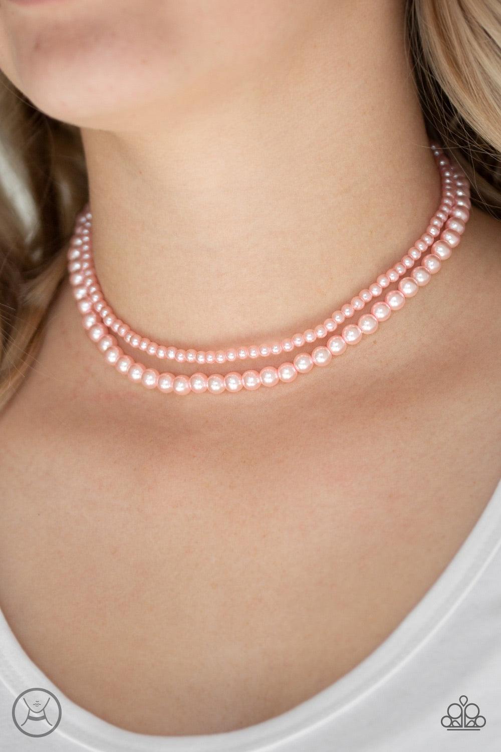 Paparazzi Accessories Ladies Choice - Pink Varying in size, two strands of dainty pink pearls wrap around the neck for a refined look. Features an adjustable clasp closure. Jewelry