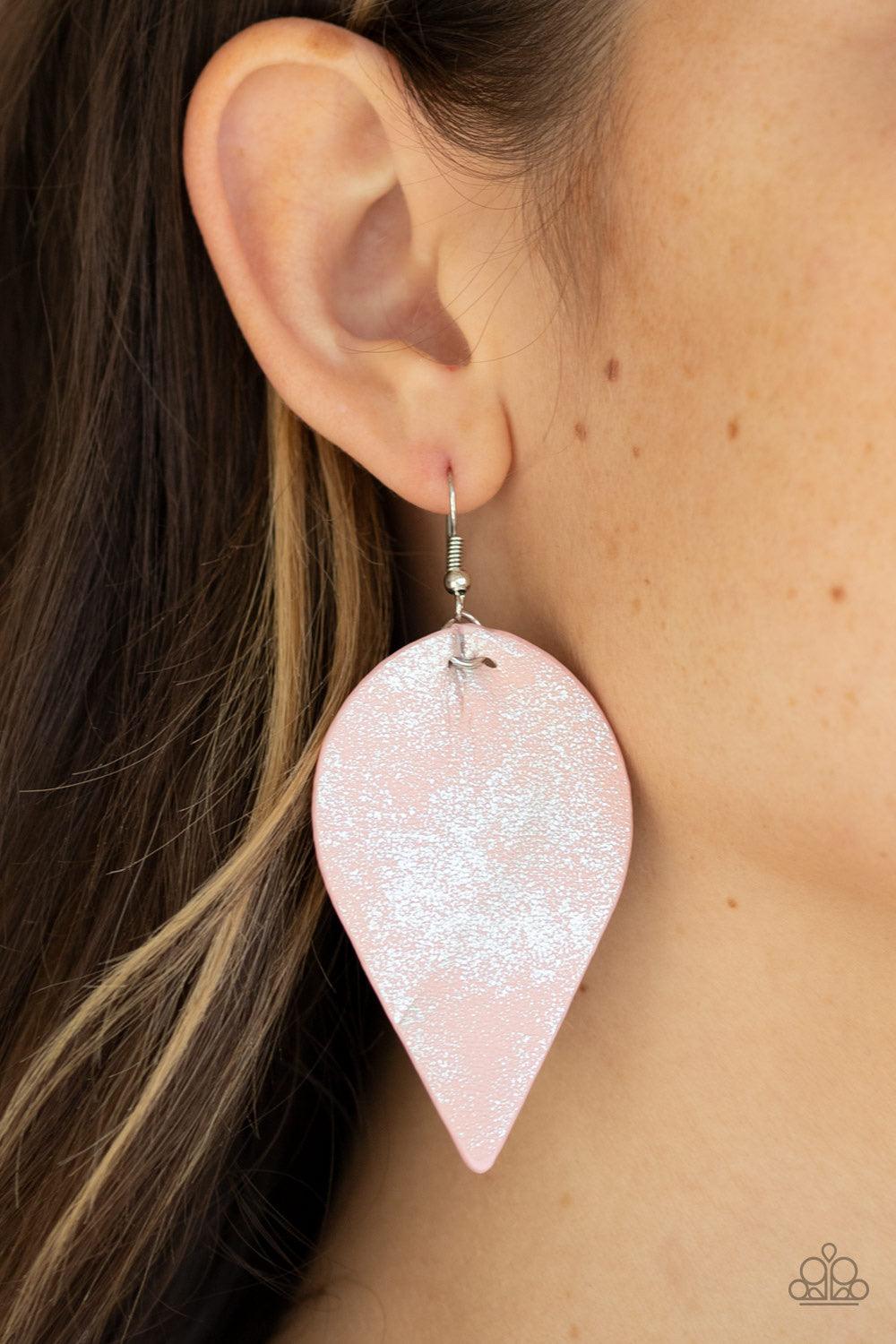 Paparazzi Accessories Enchanted Shimmer - Pink Dusted in a silvery shimmer, a leathery Coral Pink leaf swings from the ear for an enchanted look. Earring attaches to a standard fishhook fitting. Jewelry