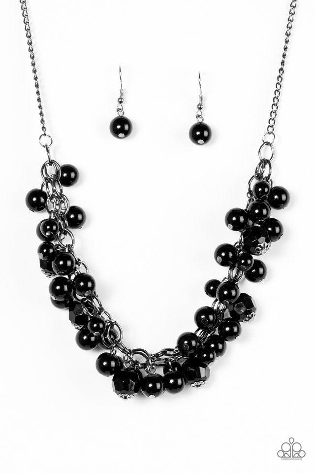 Paparazzi Accessories Time To RUNWAY - Black Glassy, polished, and faceted crystal-like beading trickle from the bottom of interlocked gunmetal chains, creating a fierce fringe. Features an adjustable clasp closure. Sold as one individual necklace. Includ