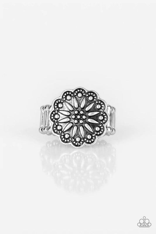 Paparazzi Accessories Desert Sunflower - Silver Embossed in a rustic wildflower pattern, a silver floral frame dots the top of the finger for a whimsical look. Features a stretchy band for a flexible fit. Sold as one individual ring. Jewelry