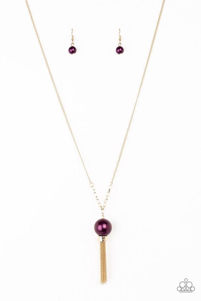Paparazzi Accessories Belle of the BALLROOM - Purple A dramatic pearly purple bead swings from the bottom of an elegantly elongated gold chain. Featuring a hammered fitting, a gold tassel streams from the bottom of the colorful pendant for a refined finis