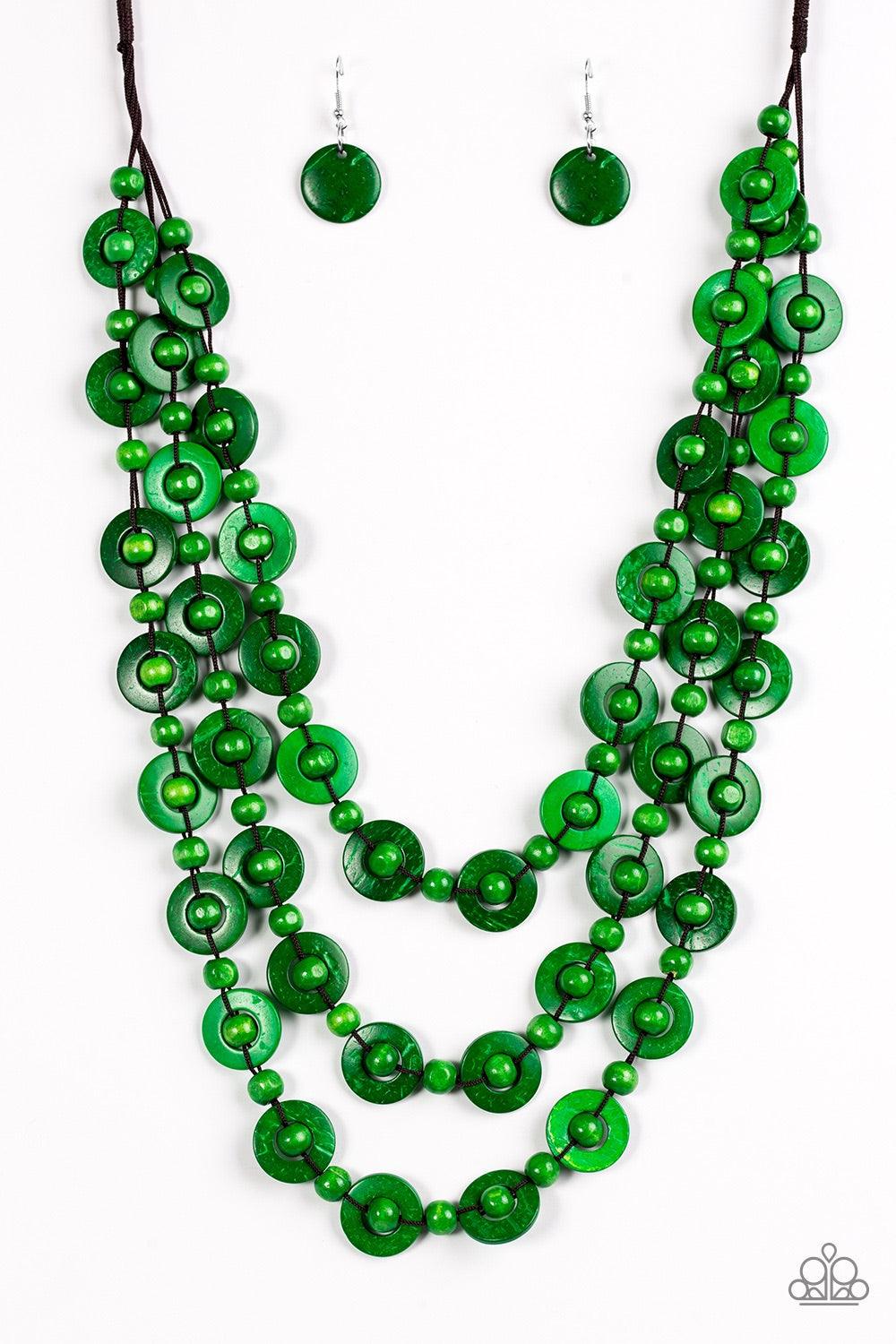 Paparazzi Accessories Bermuda Belle - Green Brushed in a refreshing green finish, wooden rings and beads are knotted in place along three strands, creating summery layers down the chest. Features a button loop closure. Jewelry
