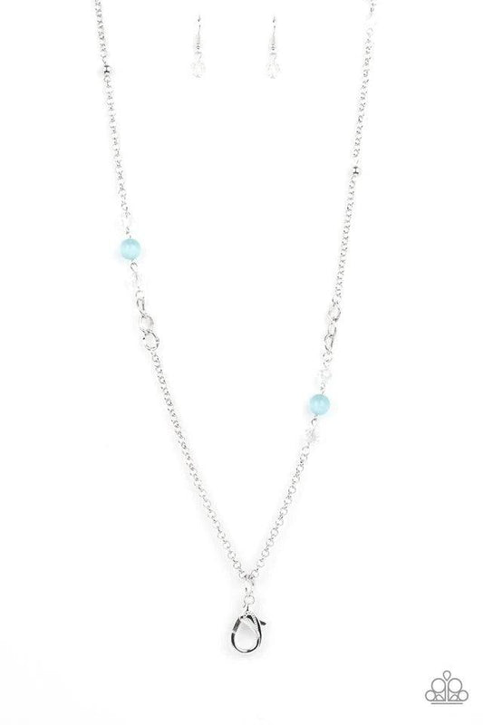 Paparazzi Accessories Teasingly Trendy - Blue *Lanyard Infused with dainty silver beads, rows of iridescent crystal-like accents and glowing Cerulean cat's eye stone beads adorn sections of mismatched silver chain across the chest for a trendy pop of colo
