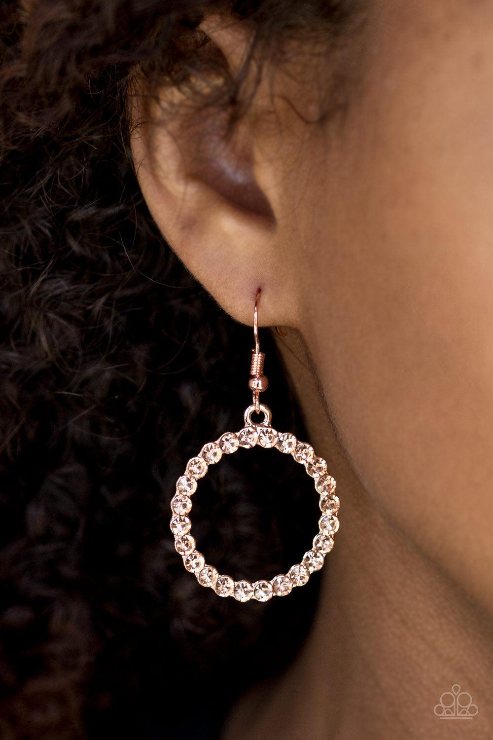 Paparazzi Accessories Bubblicious - Copper Glittery rhinestones are encrusted along a circular shiny copper frame, creating a bubbly frame. Earring attaches to a standard fishhook fitting. Jewelry