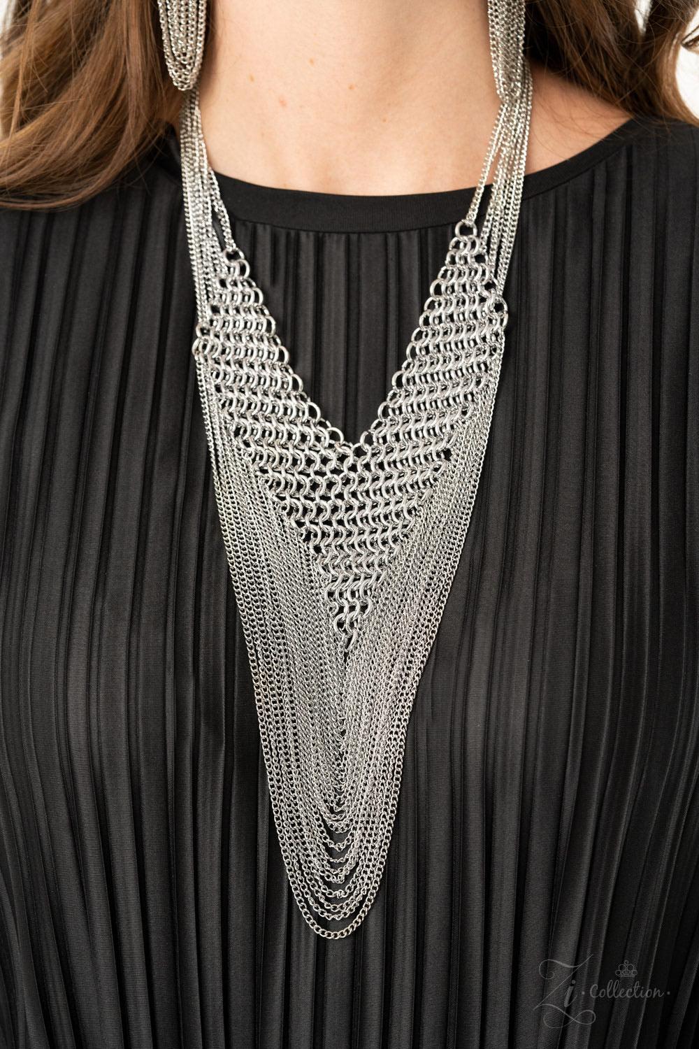 Paparazzi Accessories Defiant 💗💗ZiCollection $25💗💗 Suspended from the bottom of thickly layered chains, a rebellious mesh of silver links connect into an edgy V-shaped net. Tiers of dainty silver chains drape from the bottom of the net, creating radic