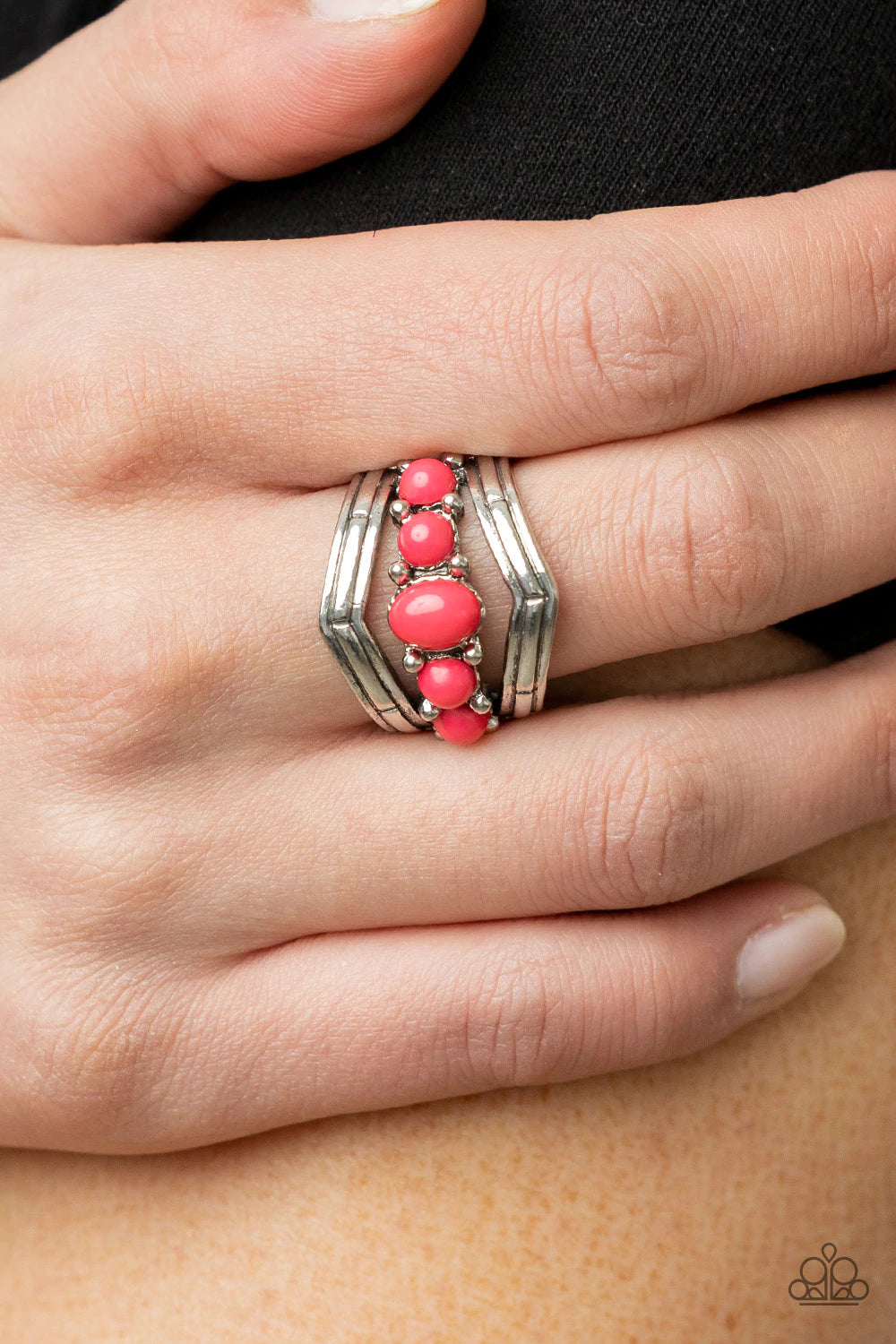 Paparazzi Accessories Show-Stopping Chevron - Pink A row of Raspberry Sorbet beads pressed into studded silver fittings floats between engraved silver chevron frames creating a trendsetting statement across the finger. Features a stretchy band for a flexi