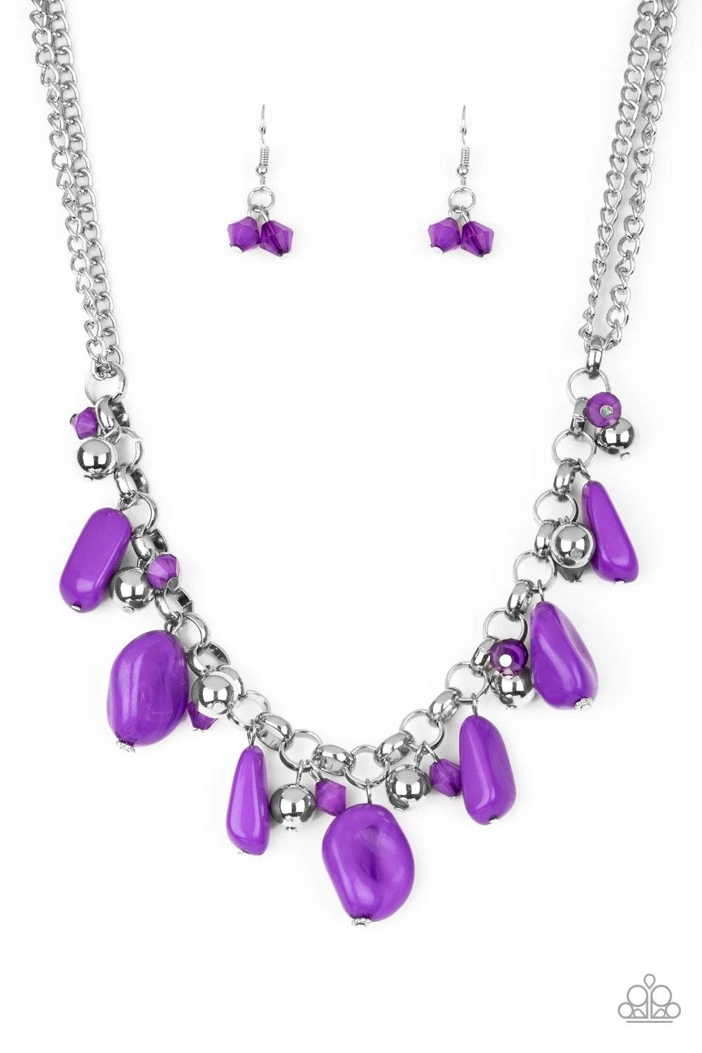 Paparazzi Accessories Grand Canyon - Purple Featuring polished and cloudy finishes, a collection of purple faux rocks dance from the bottom of a bold silver chain. Classic silver beads trickle between the colorful beading, adding a metallic shimmer to the