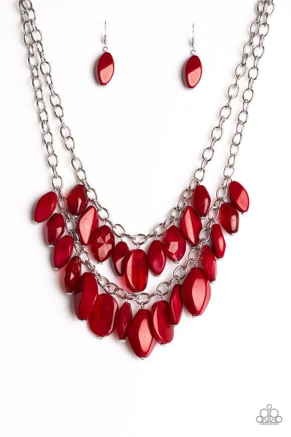 Paparazzi Accessories Royal Retreat - Red Featuring the robust shade of Wine, faceted, opaque, and crystal-like beads swing from two rows of silver chains, creating vivacious layers below the collar. Features an adjustable clasp closure. Jewelry