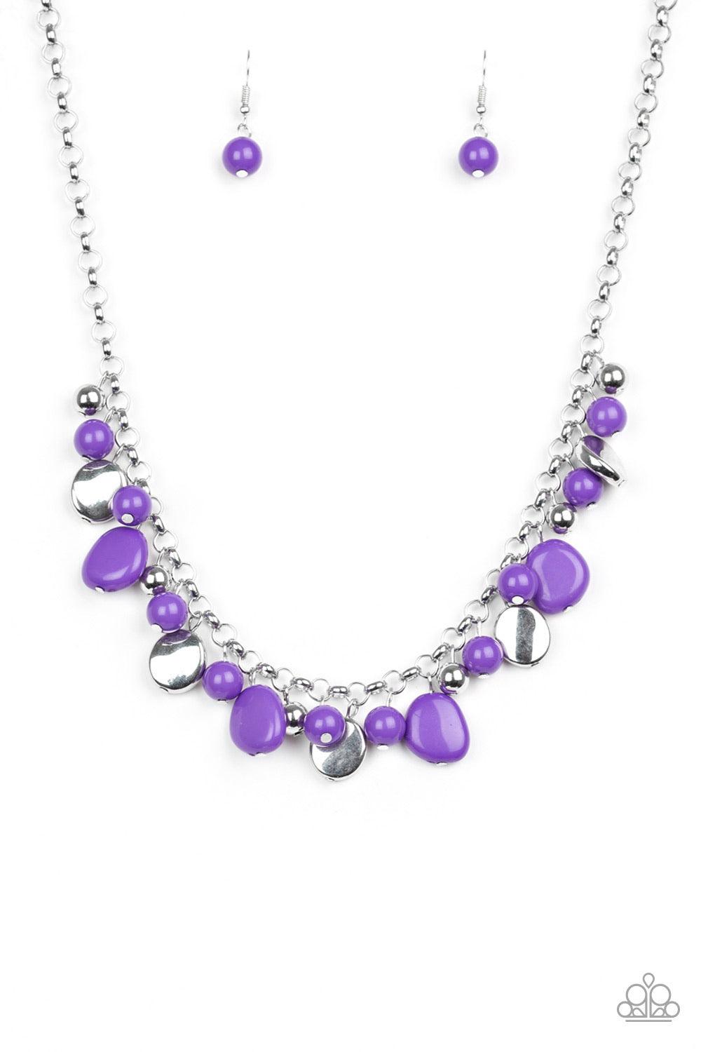 Paparazzi Accessories Flirtatiously Florida - Purple Featuring round and asymmetrical shapes, shiny silver and purple beads swing from the bottom of a bold silver chain, creating a flirtatious fringe below the collar. Features an adjustable clasp closure.