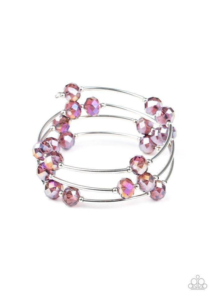 Paparazzi Accessories Dreamy Demure - Purple Glittery purple crystal-like beads, silver rods, and dainty silver beads are threaded along a coiled wire, creating a glamorous infinity wrap style bracelet around the wrist. Jewelry