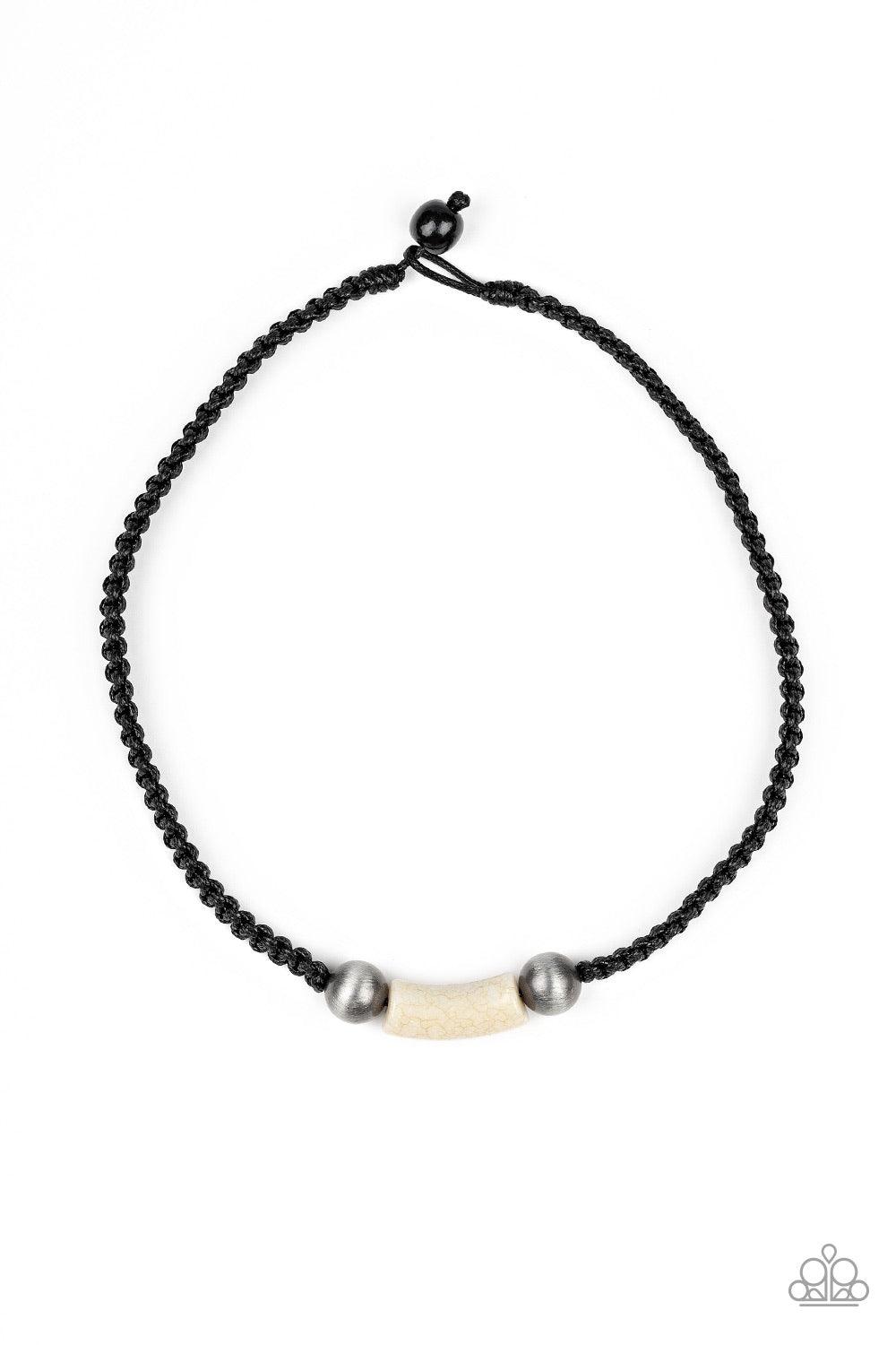 Paparazzi Accessories Gone Adventuring - Black Gunmetal cat's eye beads flank a faux marble bead along a braided black cord for an urban look. Features a button loop closure. Jewelry