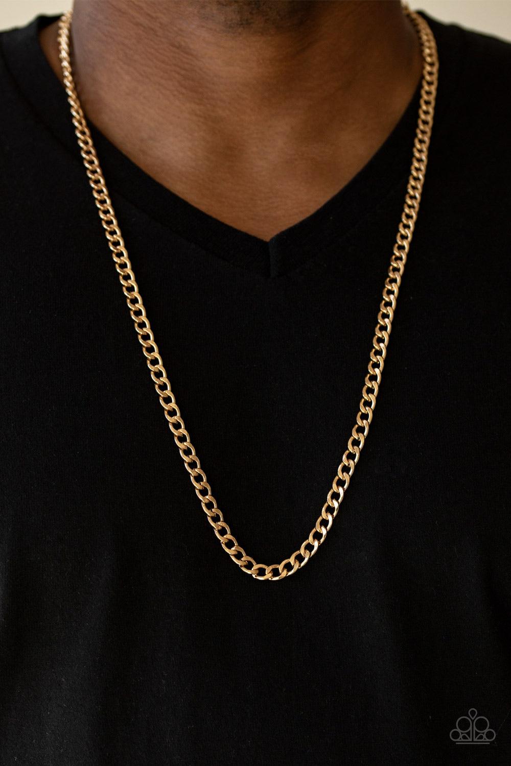 Paparazzi Accessories Delta - Gold Featuring classic curb chain, a thick gold chain drapes across the chest for a sleek, upscale look. Features an adjustable clasp closure. Jewelry