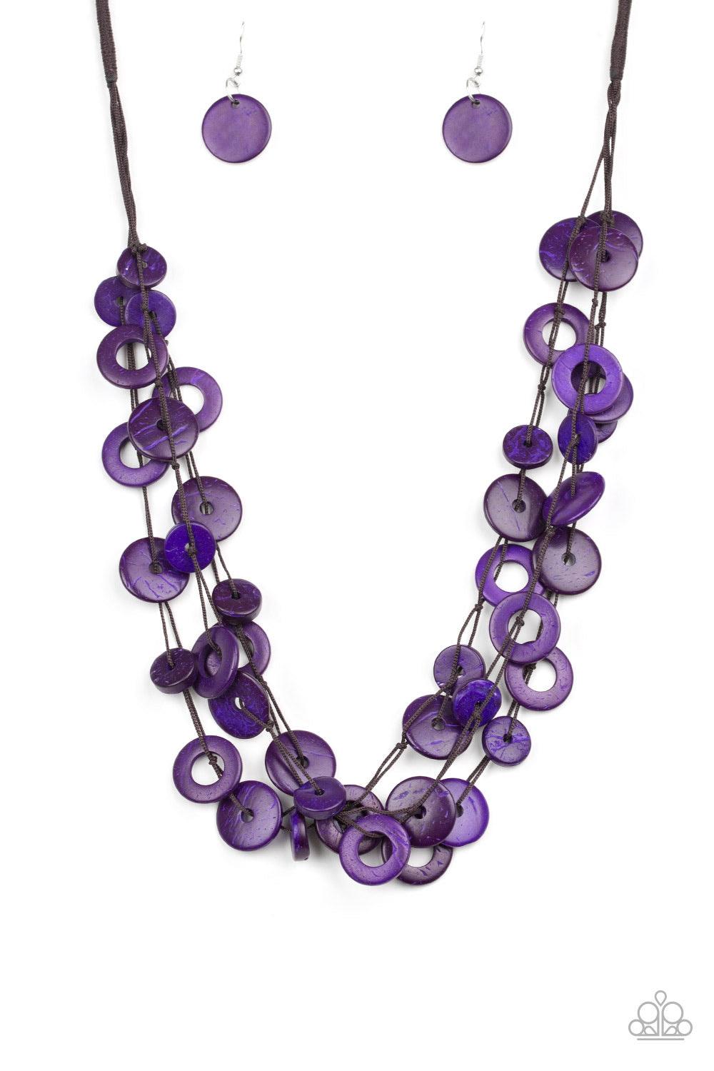 Paparazzi Accessories Wonderfully Walla Walla ~Purple Shiny brown cording knots around mismatched purple wooden beads, creating vivacious layers. Features a button loop closure.