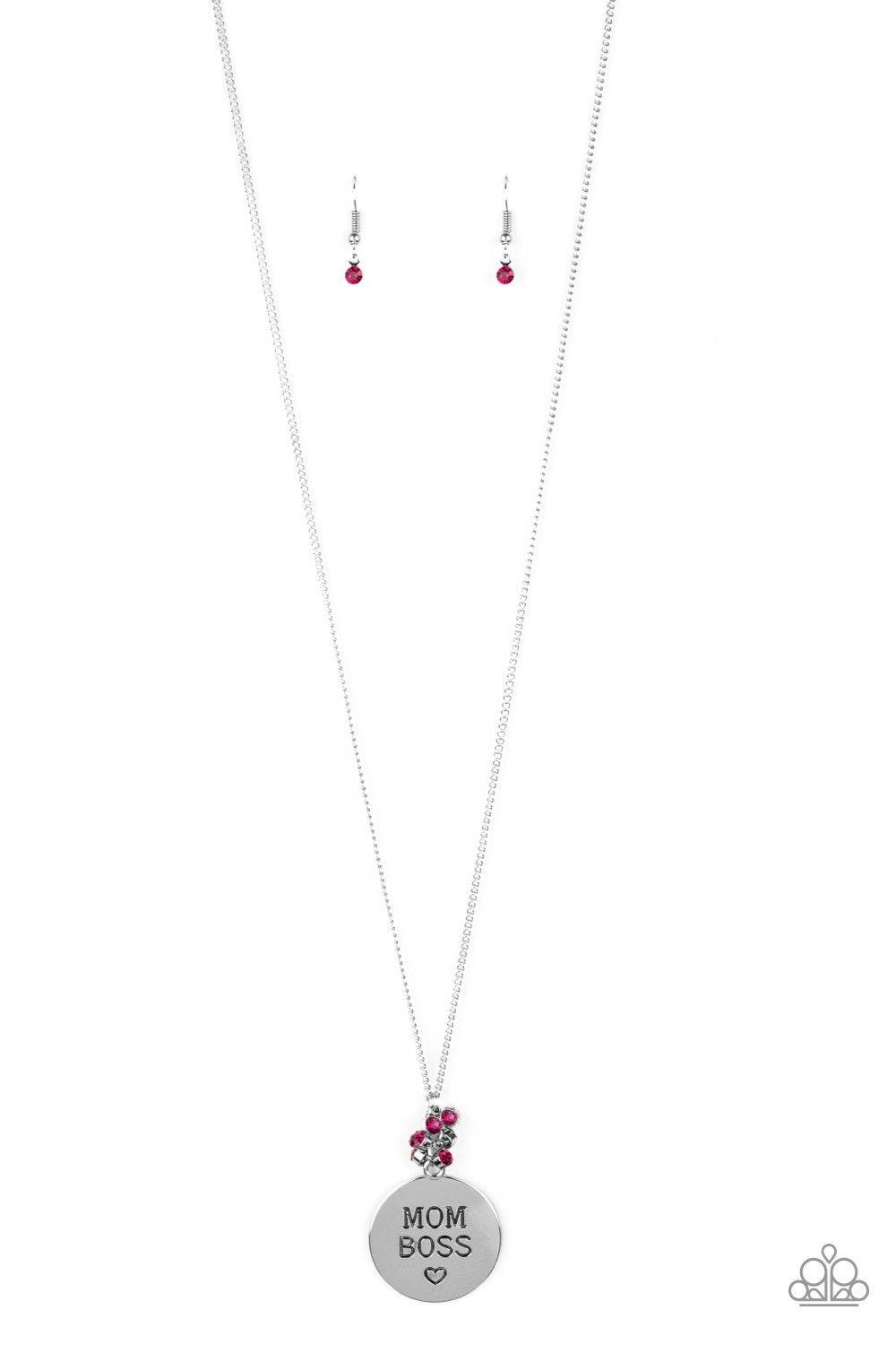 Paparazzi Accessories Mom Boss - Pink Infused with a cluster of glassy pink rhinestones, a shimmery silver disc is stamped with the inspirational phrase, "Mom Boss", for a whimsical look. Features an adjustable clasp closure. Sold as one individual neckla