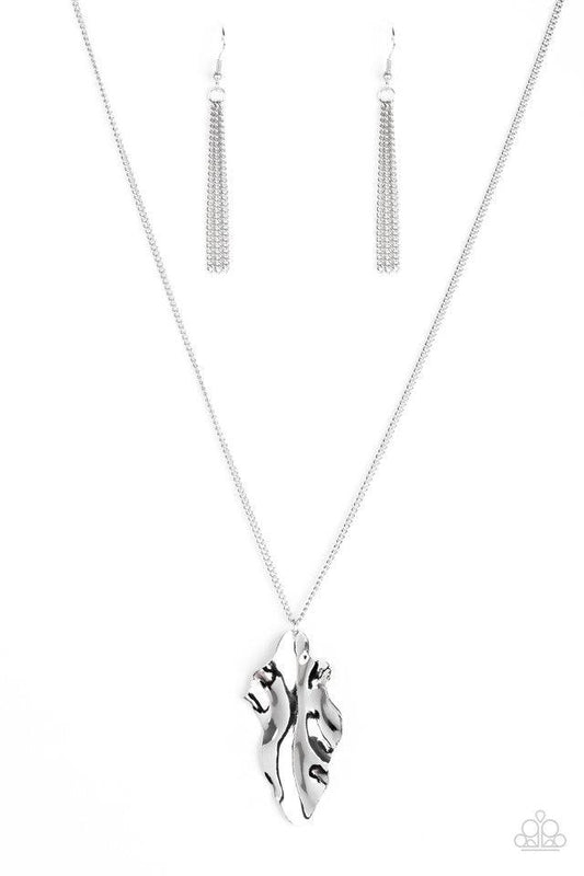 Paparazzi Accessories Fiercely Fall - Silver An elongated silver chain gives way to a rippling silver leaf-like pendant for a seasonal look. Features an adjustable clasp closure. Sold as one individual necklace. Includes one pair of matching earrings. Hos