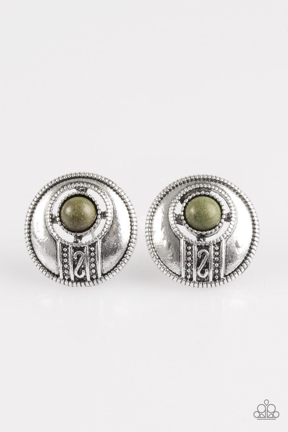 Paparazzi Accessories The Four Corners - Green A refreshing green stone adorns an antiqued suspended frame above a stunning silver filigree pattern. Silver dots dance around the outside of the stone and outer frame for an artisan inspired style. Earring a