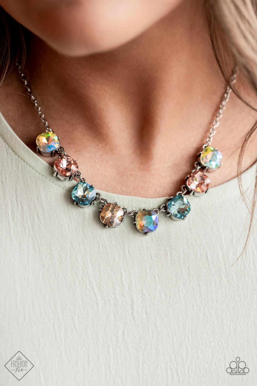 Paparazzi Accessories Dreamy Decorum - Multi A pretty pastel palette of multicolored rhinestones, set in classic silver pronged fittings, creates sparkle and shine as they dance below the collar. Features an adjustable clasp closure. Sold as one individua