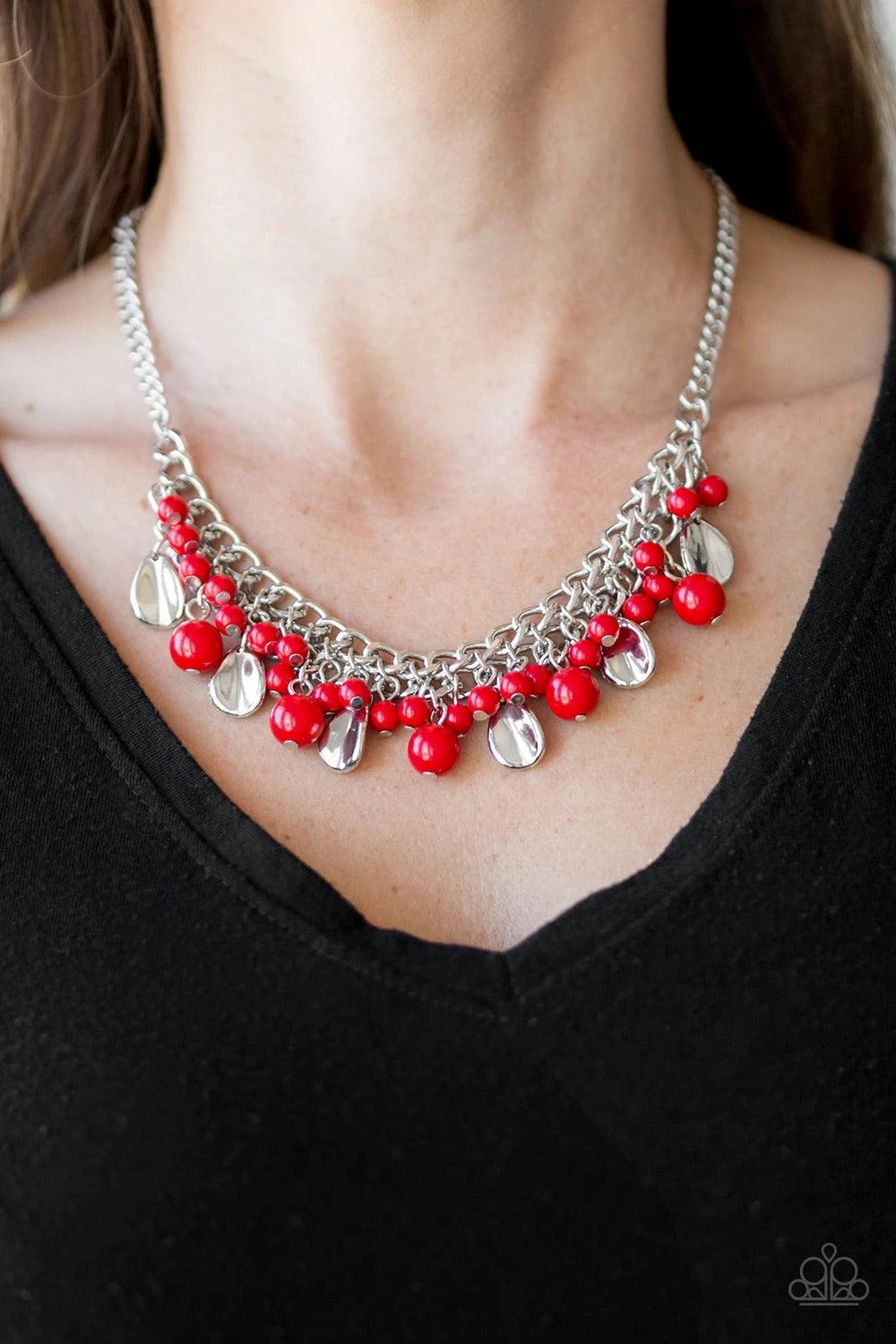 Paparazzi Accessories Summer Showdown - Red Fiery red beads and curved silver teardrops swing from the bottom of interlocking silver chains, creating a flirtatious fringe below the collar. Features an adjustable clasp closure. Sold as one individual neckl