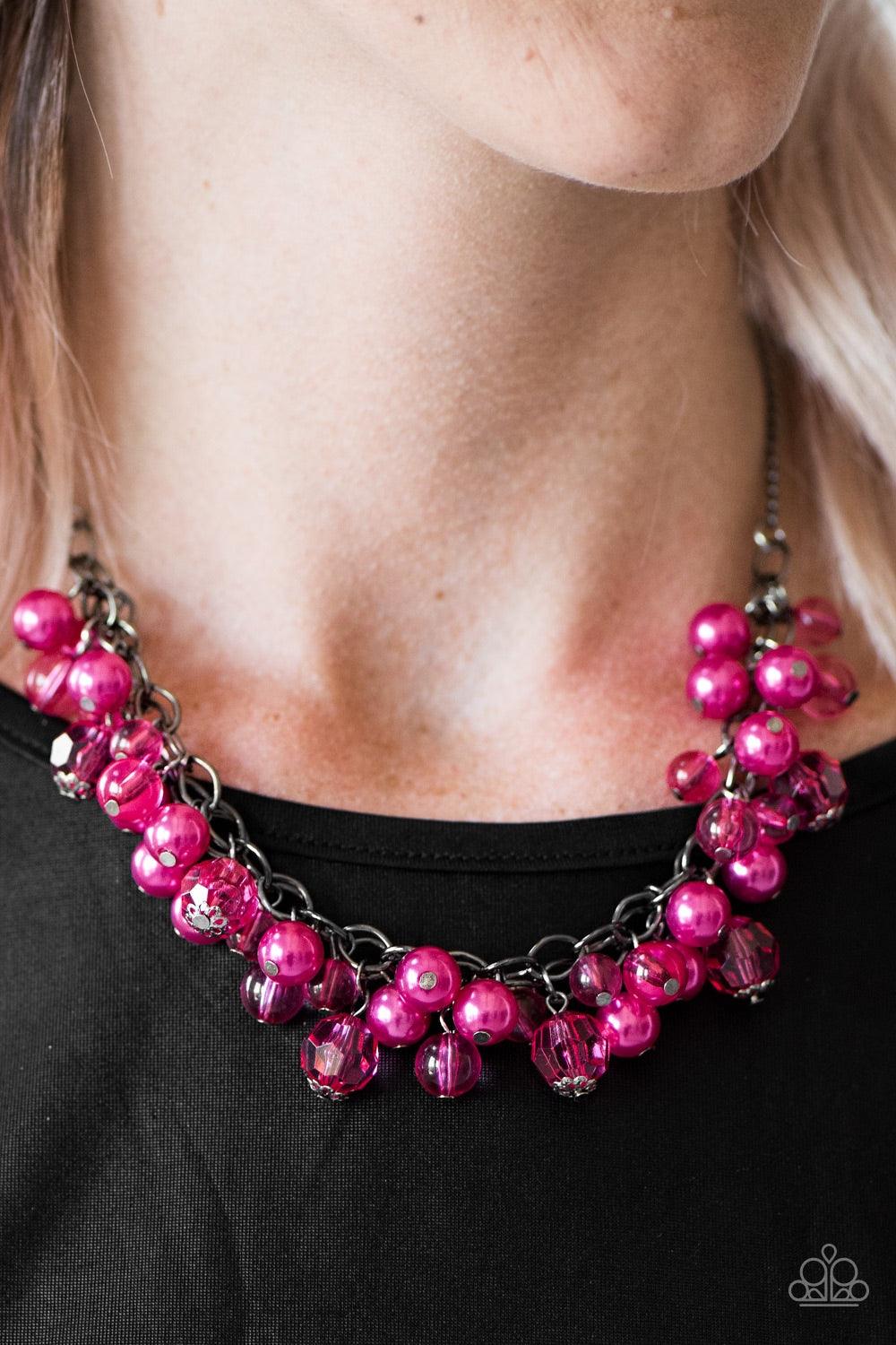 Paparazzi Accessories Time To Runway - Pink Glassy, pearly, and faceted crystal-like beading trickle from the bottom of interlocked gunmetal chains, creating a fierce fringe. Features an adjustable clasp closure. Jewelry