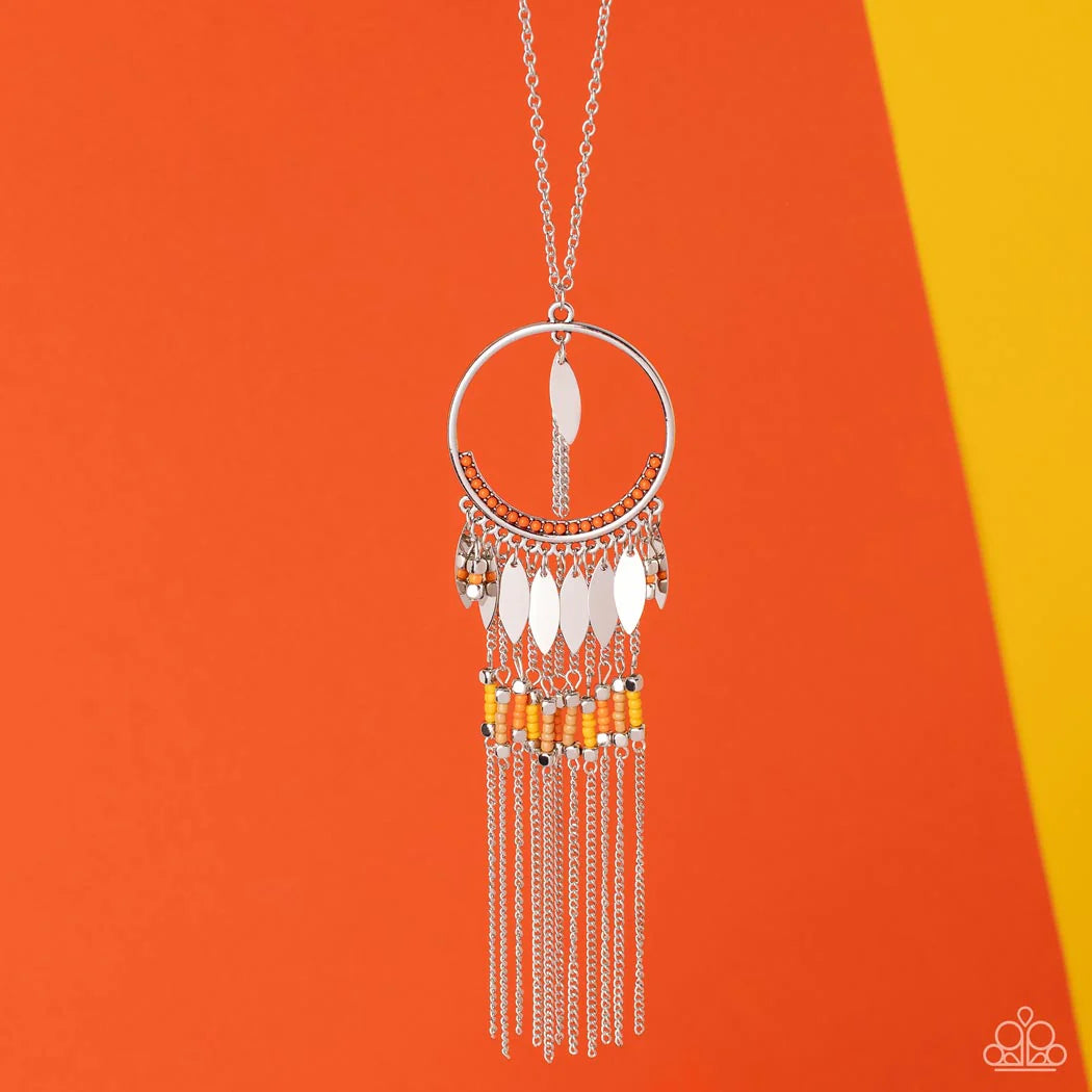 Paparazzi Accessories Dancing Dreamcatcher - Orange Leafy silver charms dangle from the bottom of an orange beaded silver hoop. The colorful pendant gives way to a silver chain fringe adorned in silver cube beads and yellow, coral, and pearly brown seed b