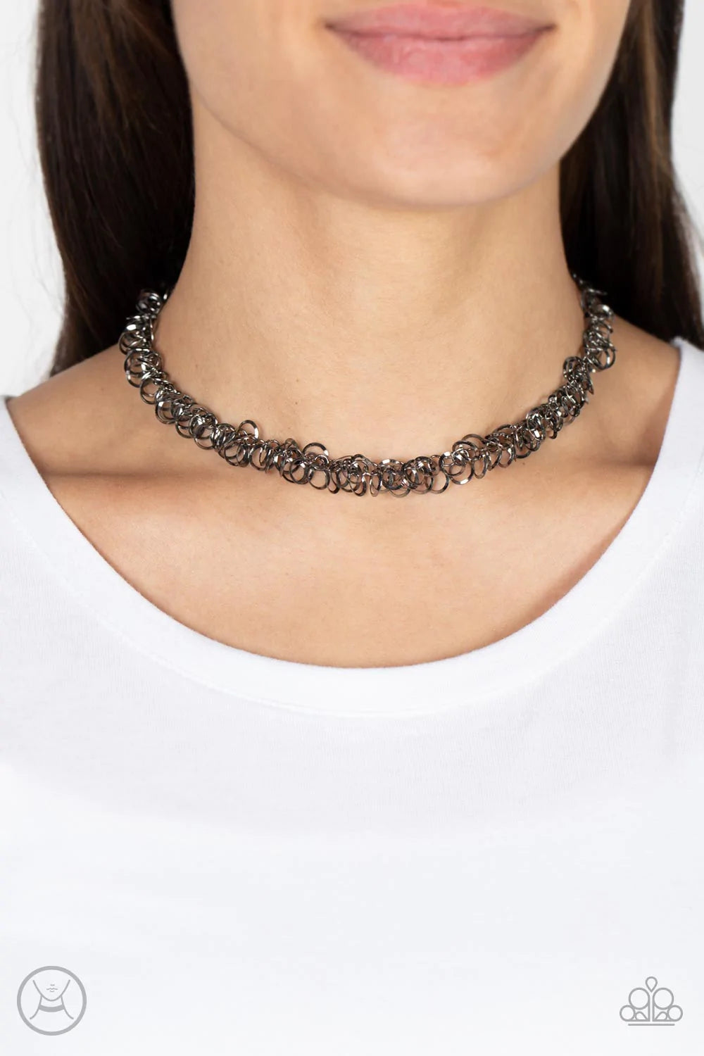 Paparazzi Accessories Cause A Commotion - Black A shiny series of flat and beveled gunmetal hoops delicately cluster along a dainty gunmetal chain around the neck, creating a tinkling fringe. Features an adjustable clasp closure. Sold as one individual ch