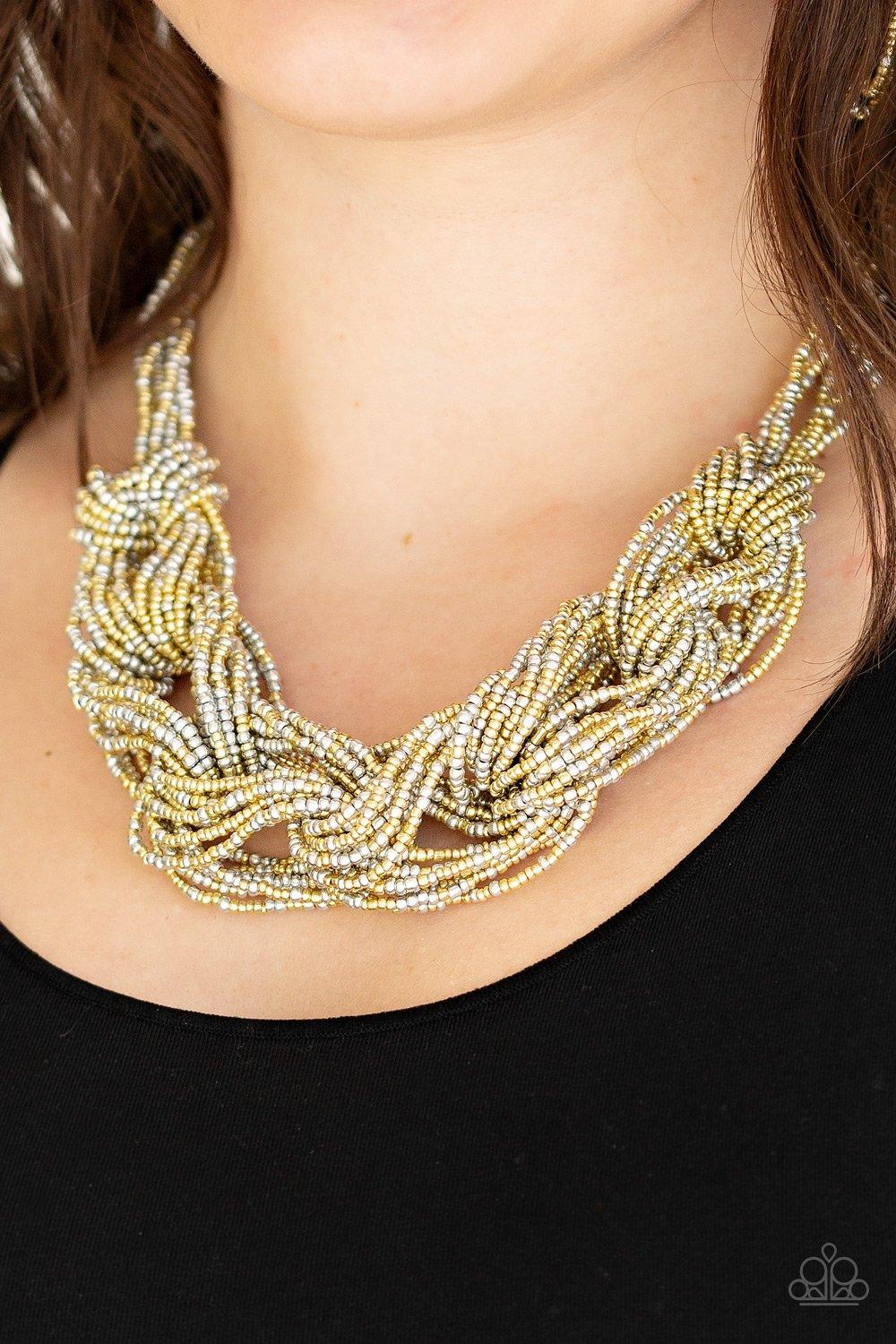 Paparazzi Accessories City Catwalk - Gold Brushed in a flashy finish, countless strands of gold and silver seed beads weave into a bulky square braid below the collar for a glamorous look. Features an adjustable clasp closure. Sold as one individual neckl