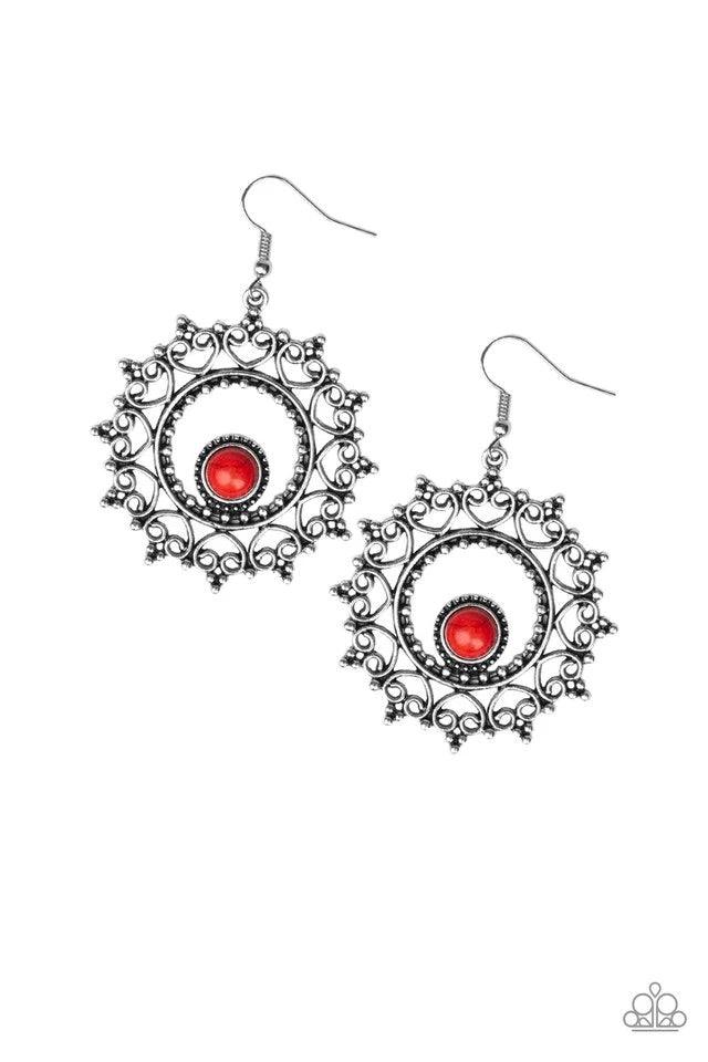 Paparazzi Accessories Wreathed In Whimsically - Red Featuring studded details, frilly heart-shaped filigree spins around a smooth red stone bead, creating a whimsical wreath. Earring attaches to a standard fishhook fitting. Sold as one pair of earrings. J