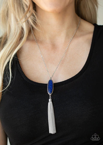Paparazzi Accessories Stay Cool - Blue A shimmery silver tassel streams from the bottom of a glittery blue beaded pendant, creating a dazzling look at the bottom of a lengthened silver chain. Features an adjustable clasp closure. Sold as one individual ne