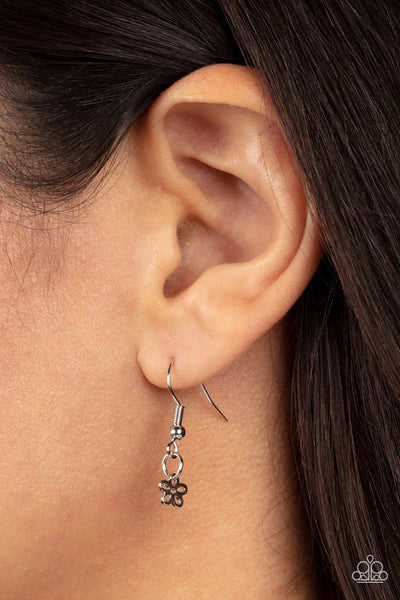 Paparazzi Accessories Flower Patch Fabulous - Yellow Dainty silver flowers adorn the bottom of a sparkly yellow teardrop gem at the bottom of a dainty silver chain, creating a prismatic pendant below the collar. Features an adjustable clasp closure. Sold