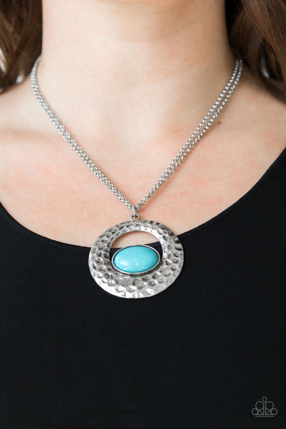 Paparazzi Accessories Viva Vivacious ~Blue A refreshing blue bead is pressed into the bottom of a shimmery silver frame rippling with hammered textures for a seasonal look. Features an adjustable clasp closure. Sold as one individual necklace. Includes on