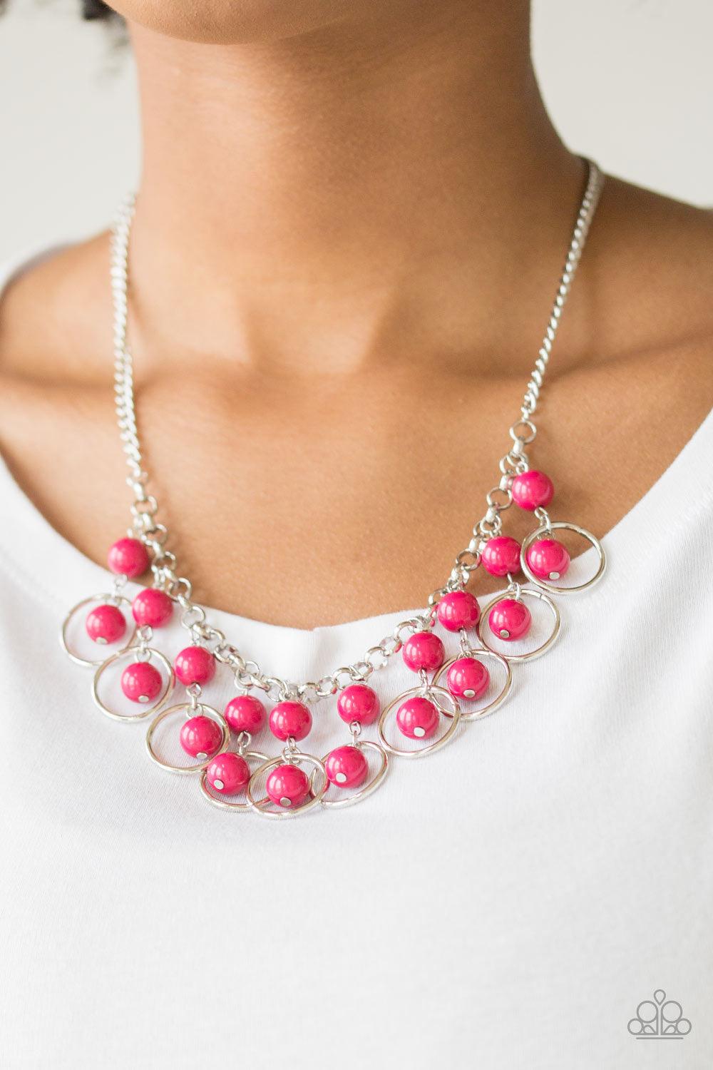 Paparazzi Accessories Really Rococo - Pink Polished pink beads and shimmery silver hoops drip from the bottom of a glistening silver chain, creating a playful fringe below the collar. Features an adjustable clasp closure. Sold as one individual necklace.