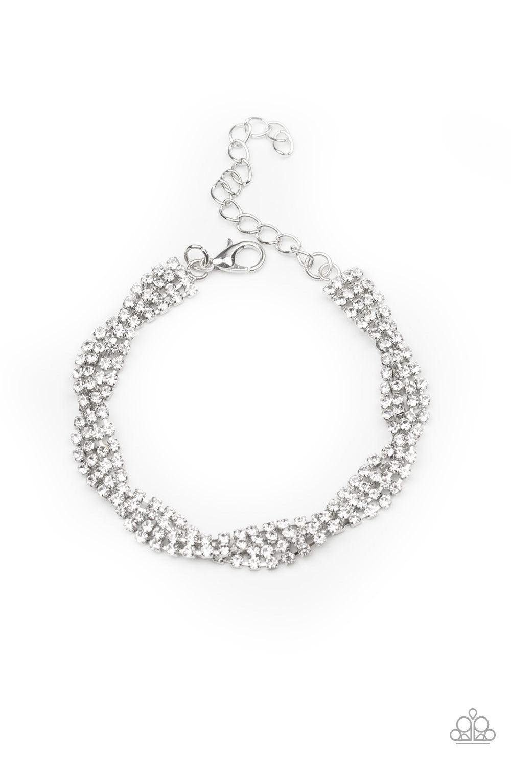 Paparazzi Accessories Braided Twilight - White Infused with glistening silver fittings, strands of glassy white rhinestones delicately braid across the wrist in timeless fashion. Features an adjustable clasp closure. Jewelry