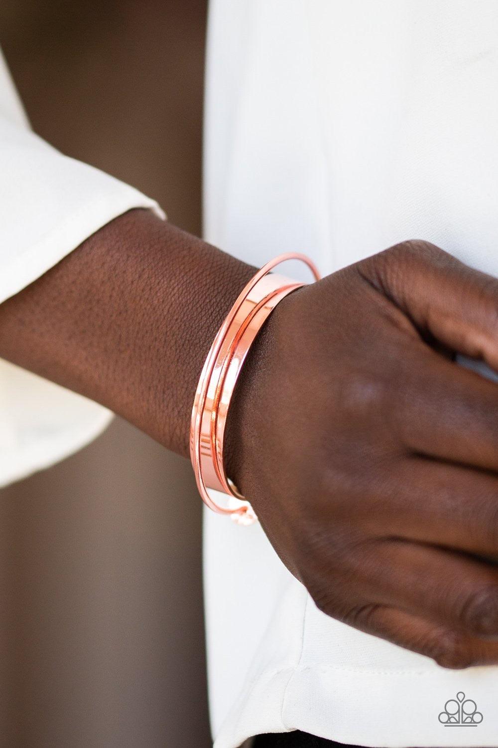 Paparazzi Accessories Avant- MOD - Copper Featuring shiny copper beaded fittings, a dainty shiny copper bar arcs over a flat shiny copper cuff and is fitted in place for a sleek, modern look. Jewelry